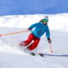 Female Riding on Ski Blades on Snow Covered Ground