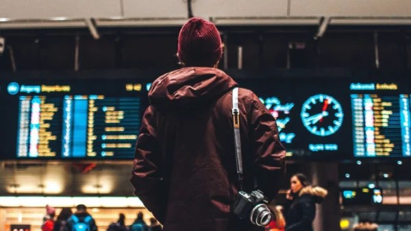 A man standing inside the airport